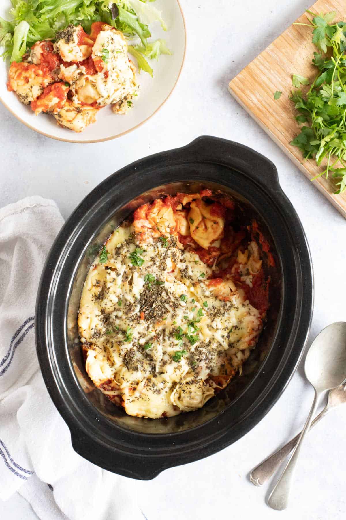 Cheesy tortellini in slow cooker.