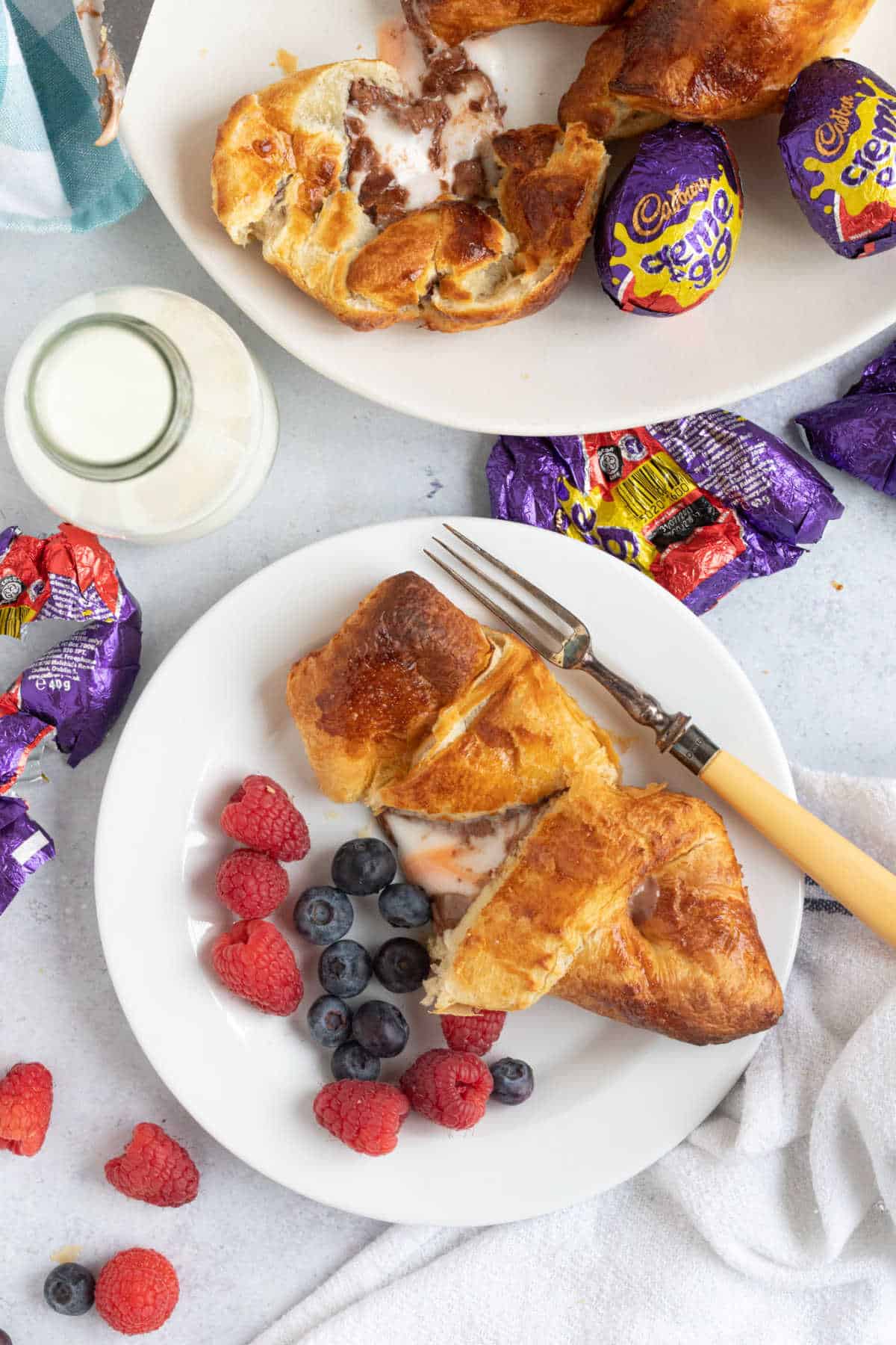 Cream egg croissants with fresh berries.