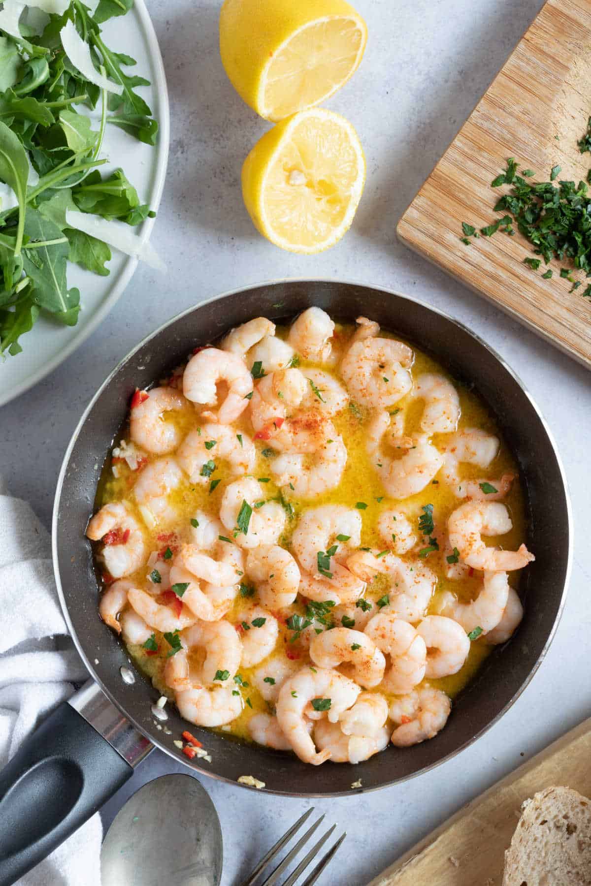 Pil Pil Prawns with bread and salad.