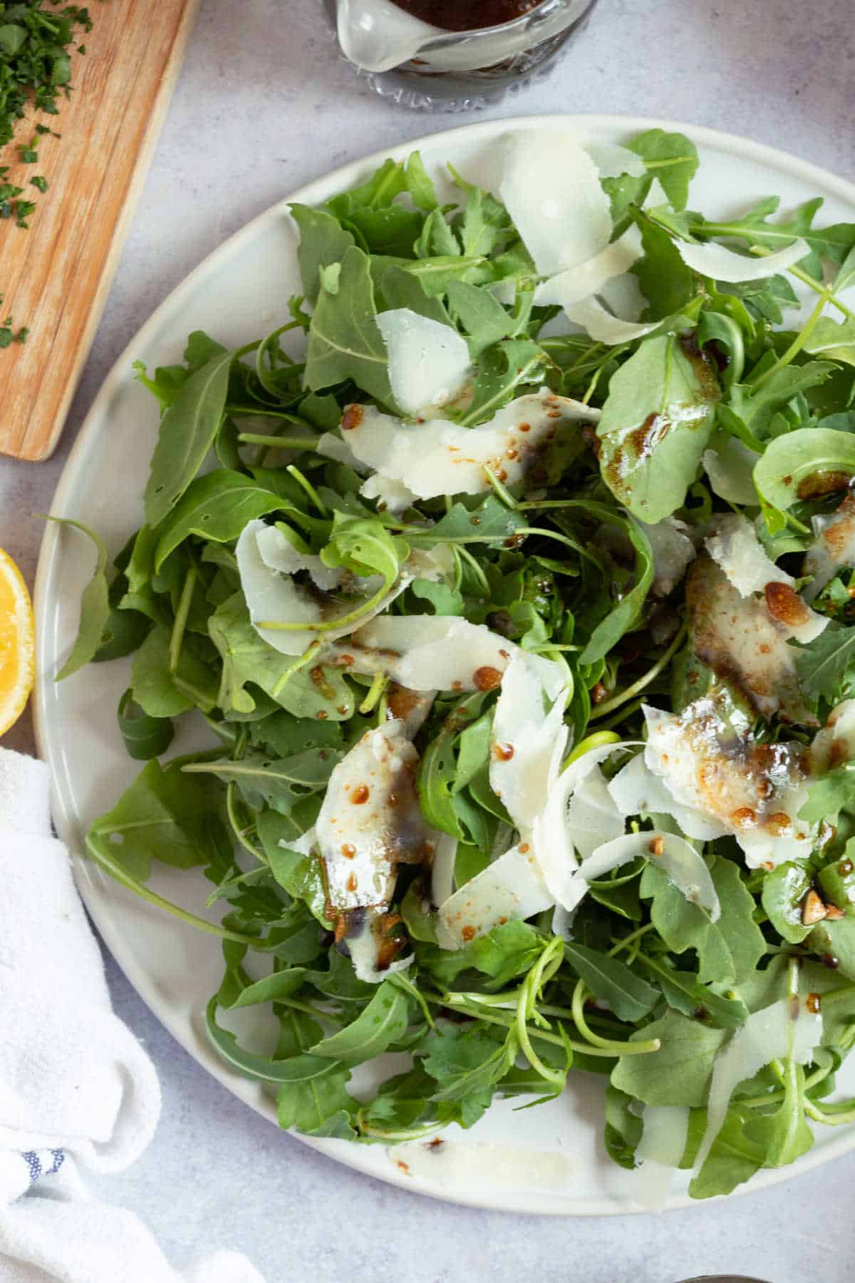 Rocket salad with a balsamic dressing.