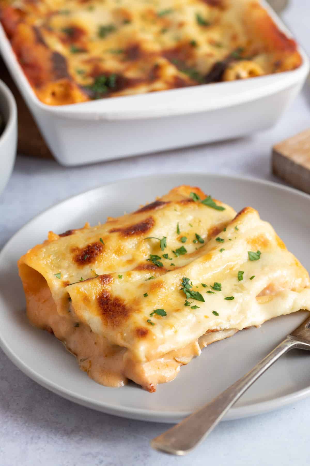 A plate of spinach and ricotta cannelloni.