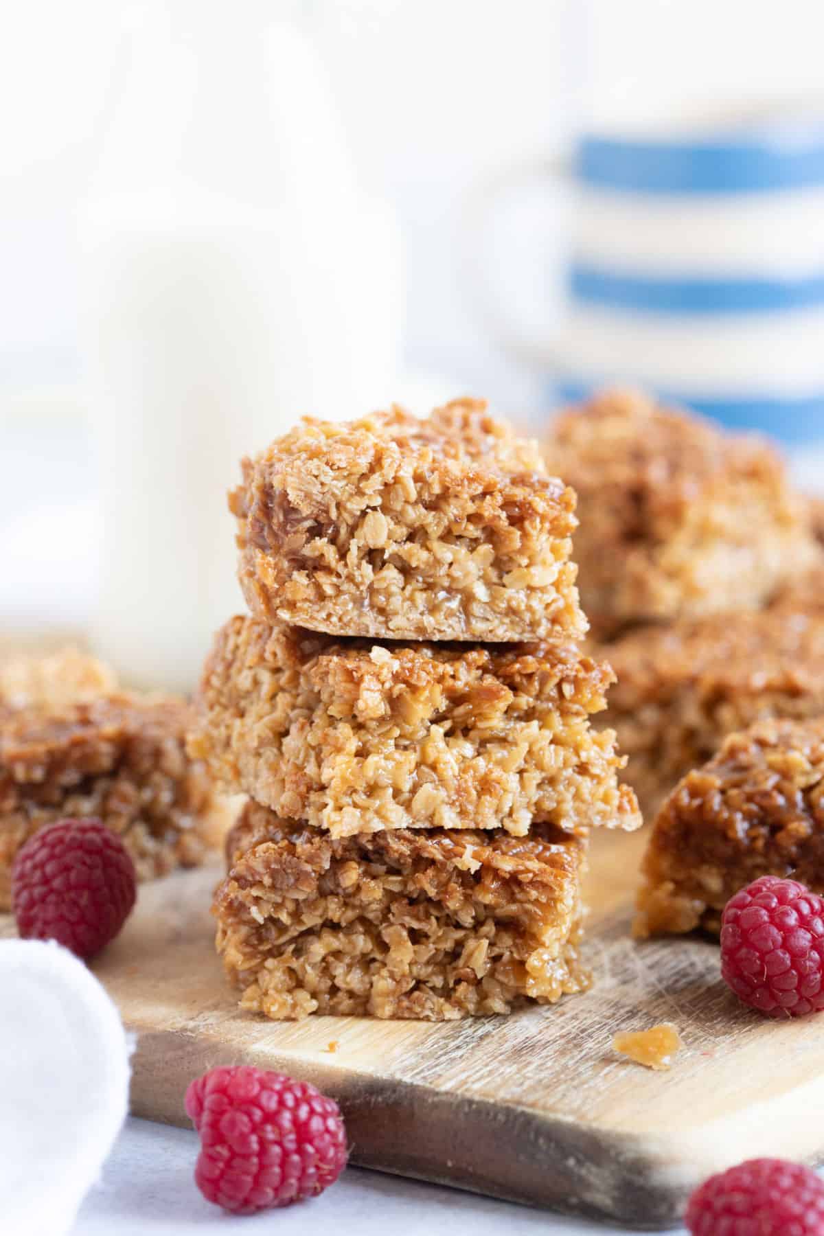 A stack of air fryer flapjacks on a wooden board.