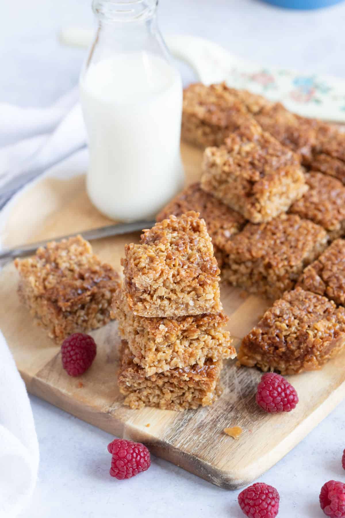 Air fryer flapjacks on a wooden board.