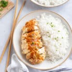 Air fryer chicken katsu with a homemade katsu curry sauce drizzled on top.