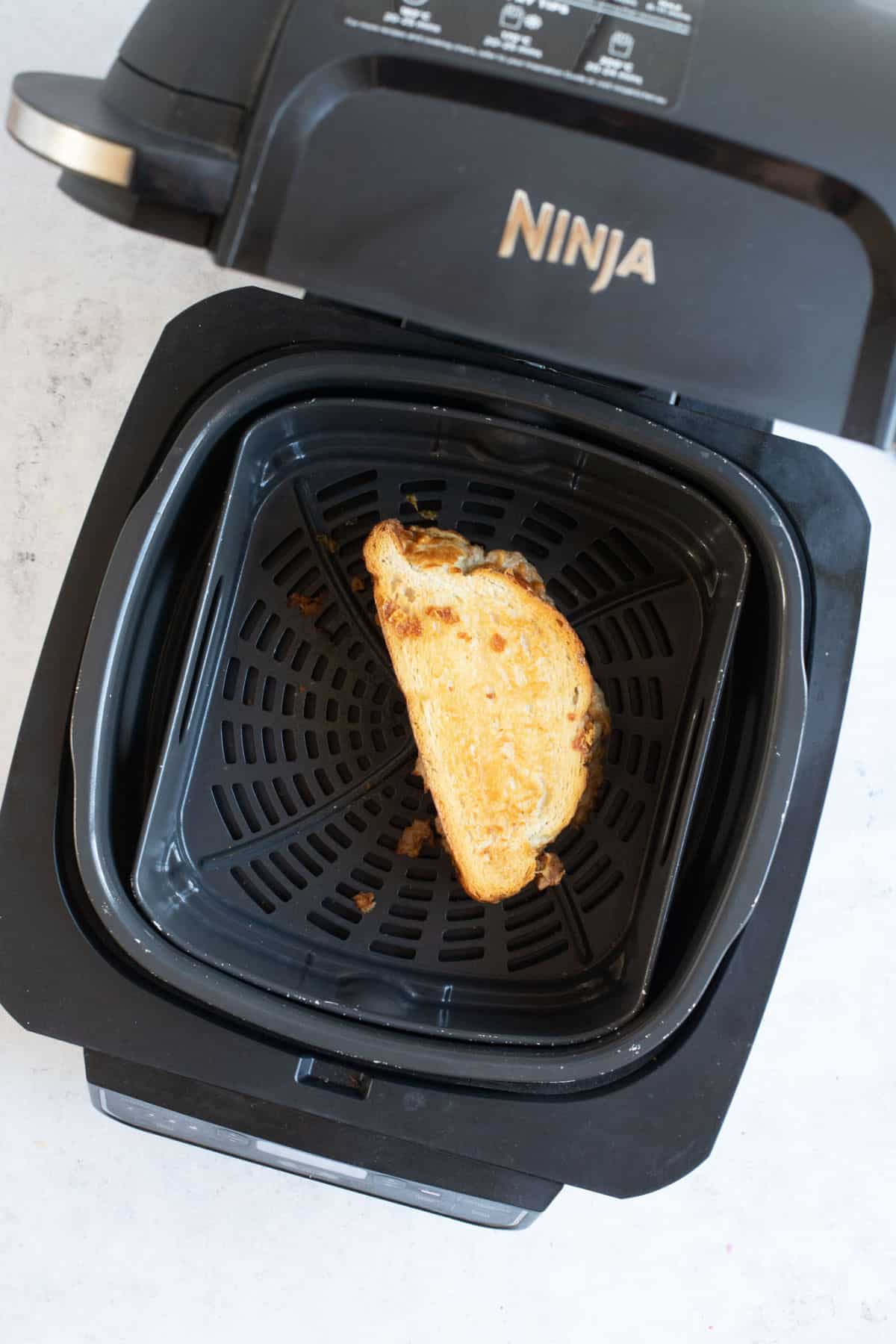Tuna melt in Ninja air fryer basket.