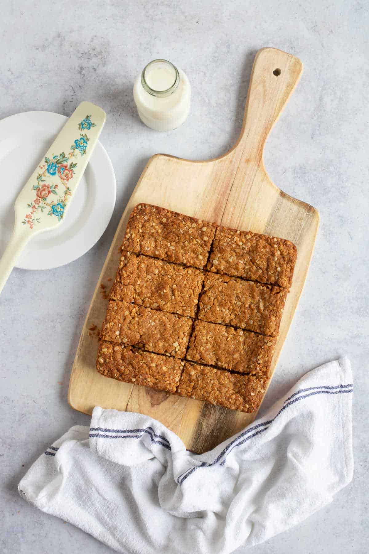 Anzac bars on a wooden board.