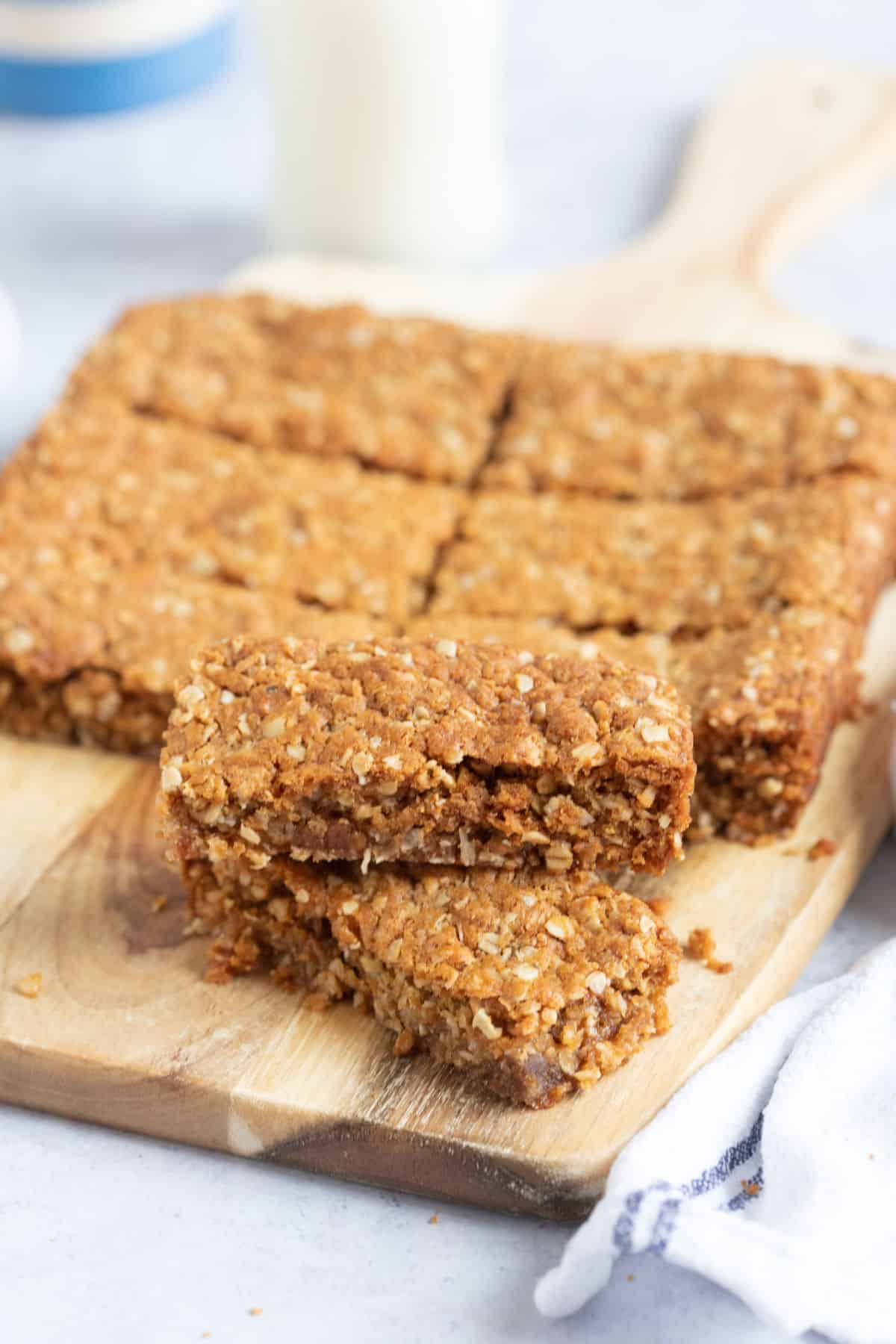 Anzac bars on a cutting board.