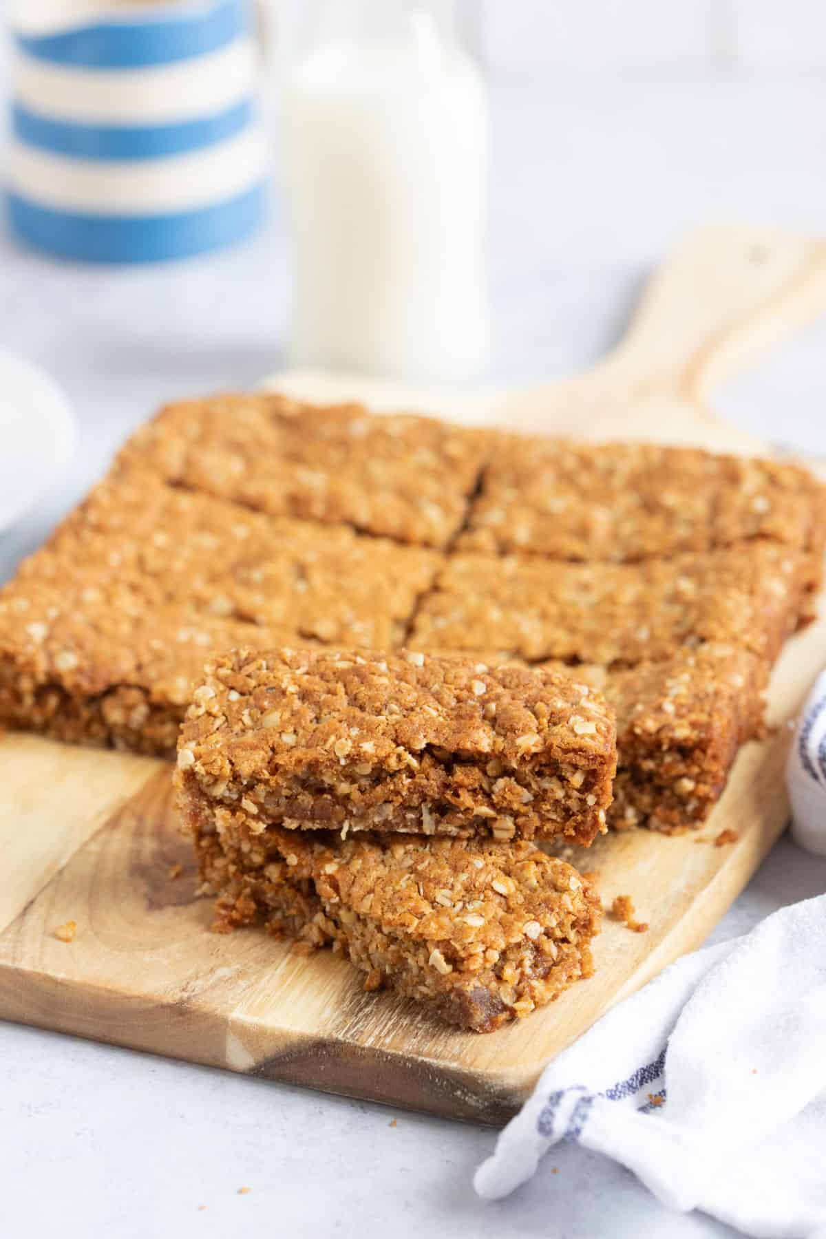 Anzac slices on a wooden board.