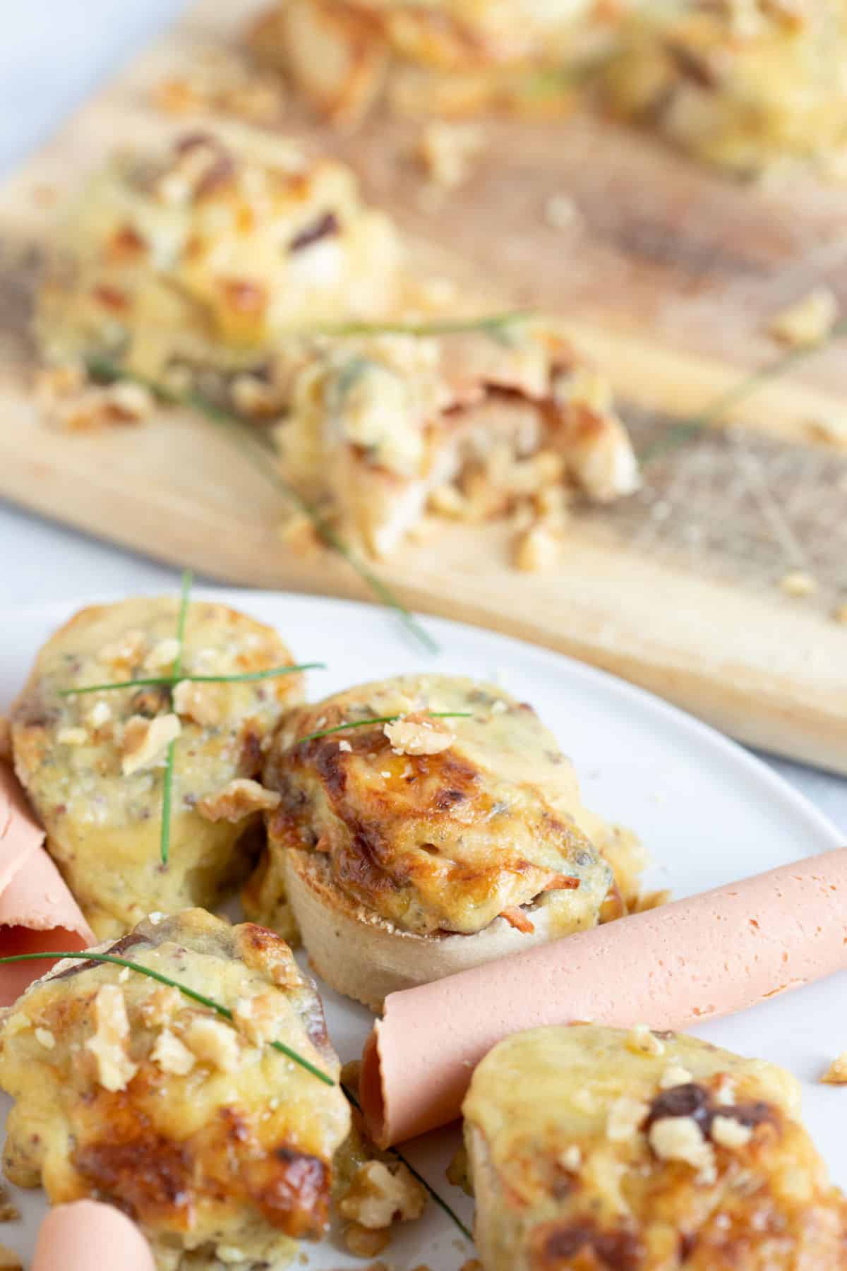 Rarebit bites on a white platter.