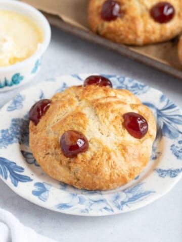 Victoria scone with glace cherries on top.