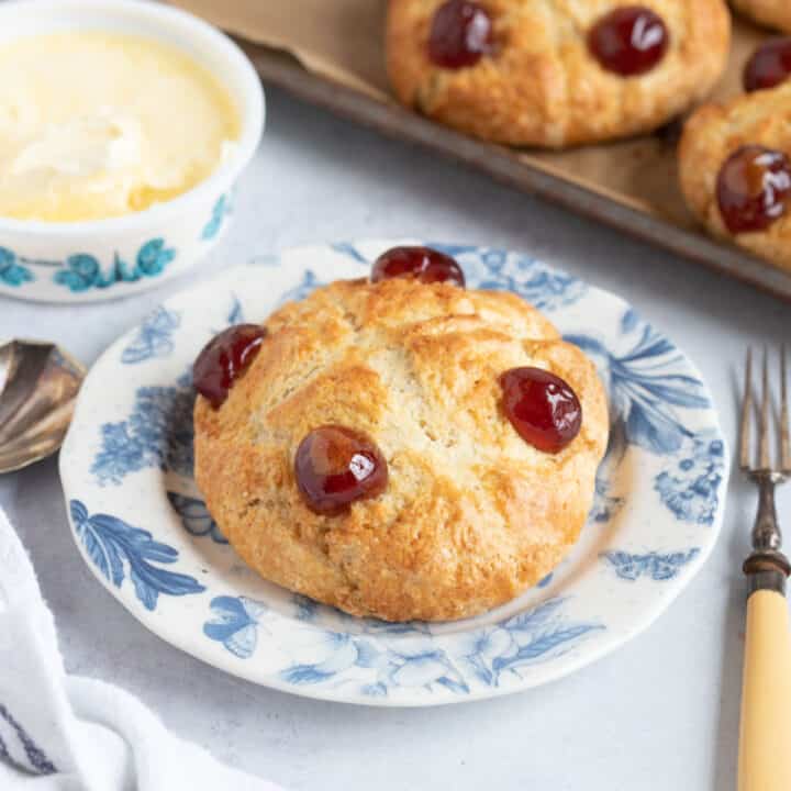 Victoria scone with glace cherries on top.