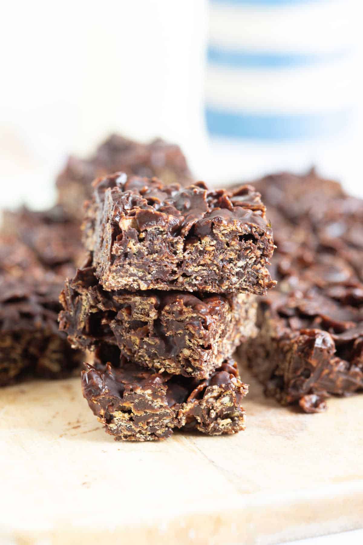 A stack of no bake chocolate cracknell slices.