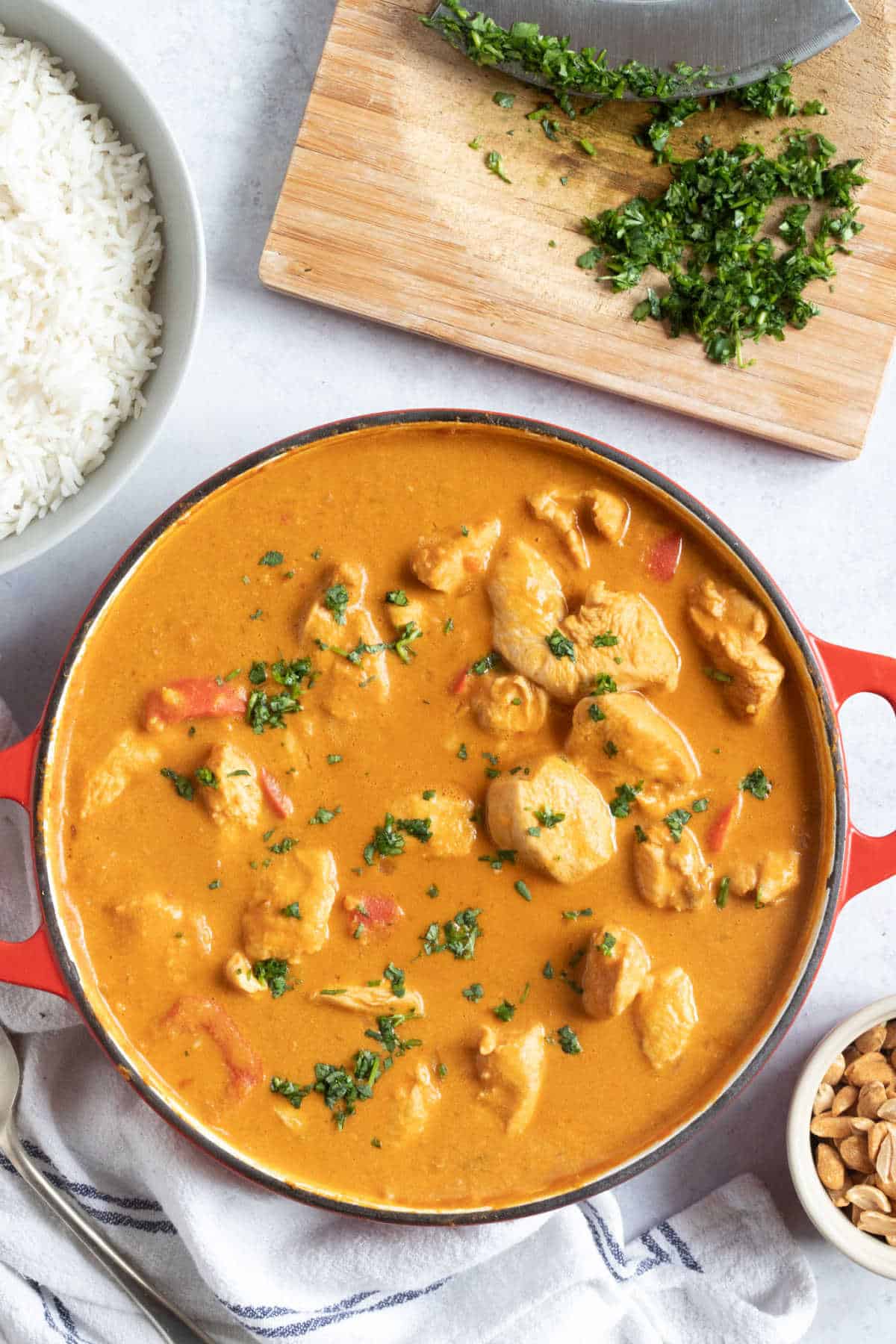 A pan of peanut butter chicken curry.
