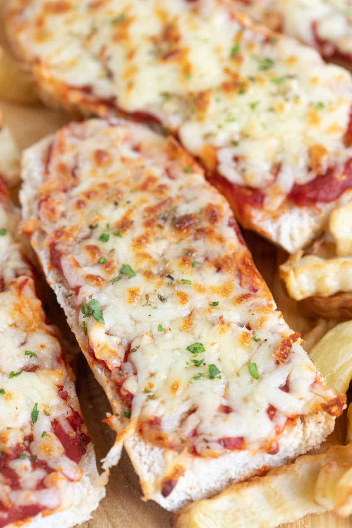 A close up of a slice of air fryer French bread pizza.