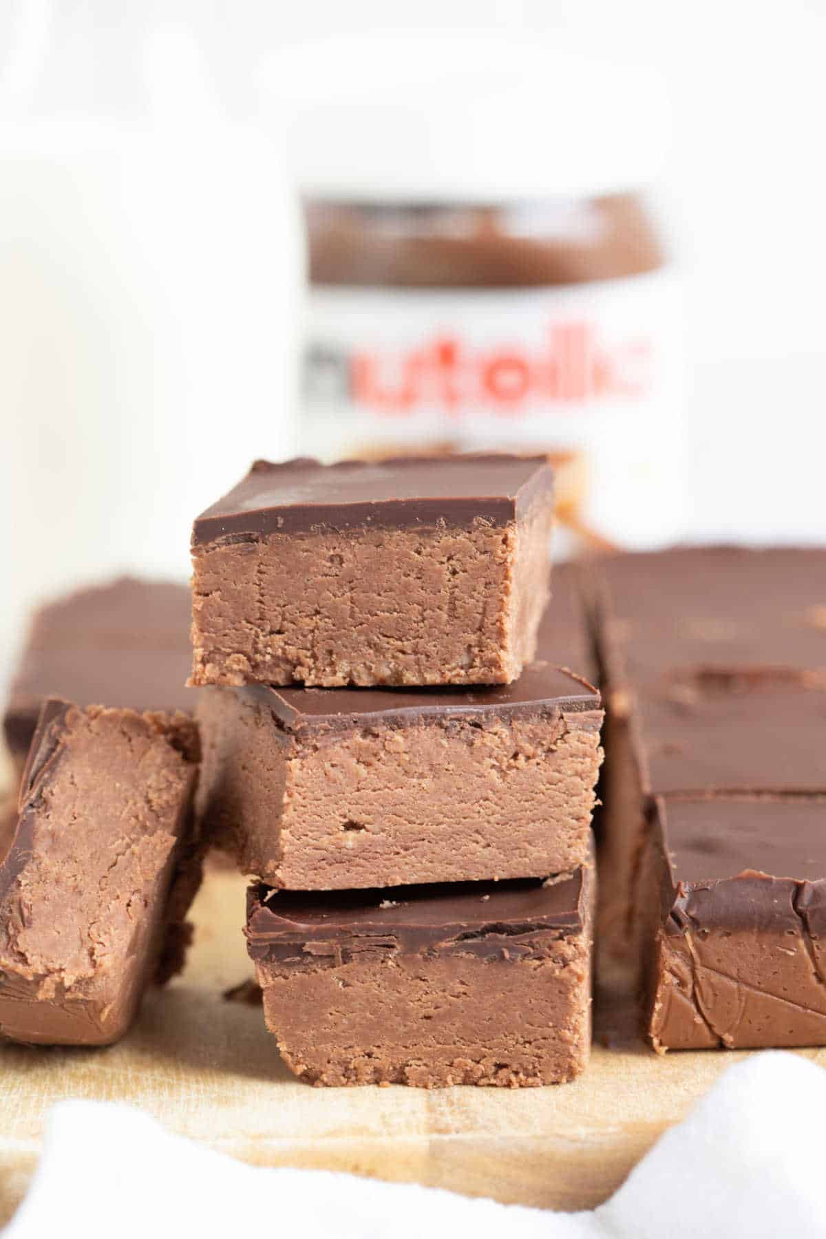 A stack of no bake Nutella biscuit slices.