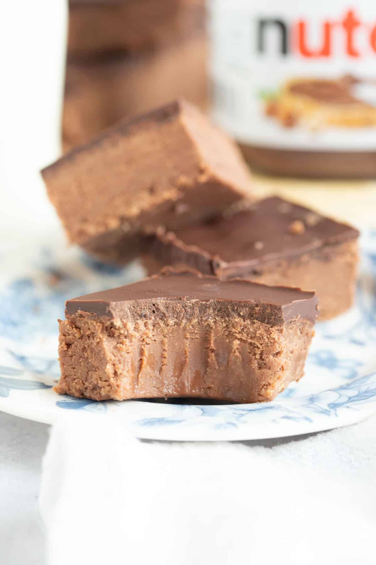 A half eaten no bake chocolate Nutella biscuit slice.