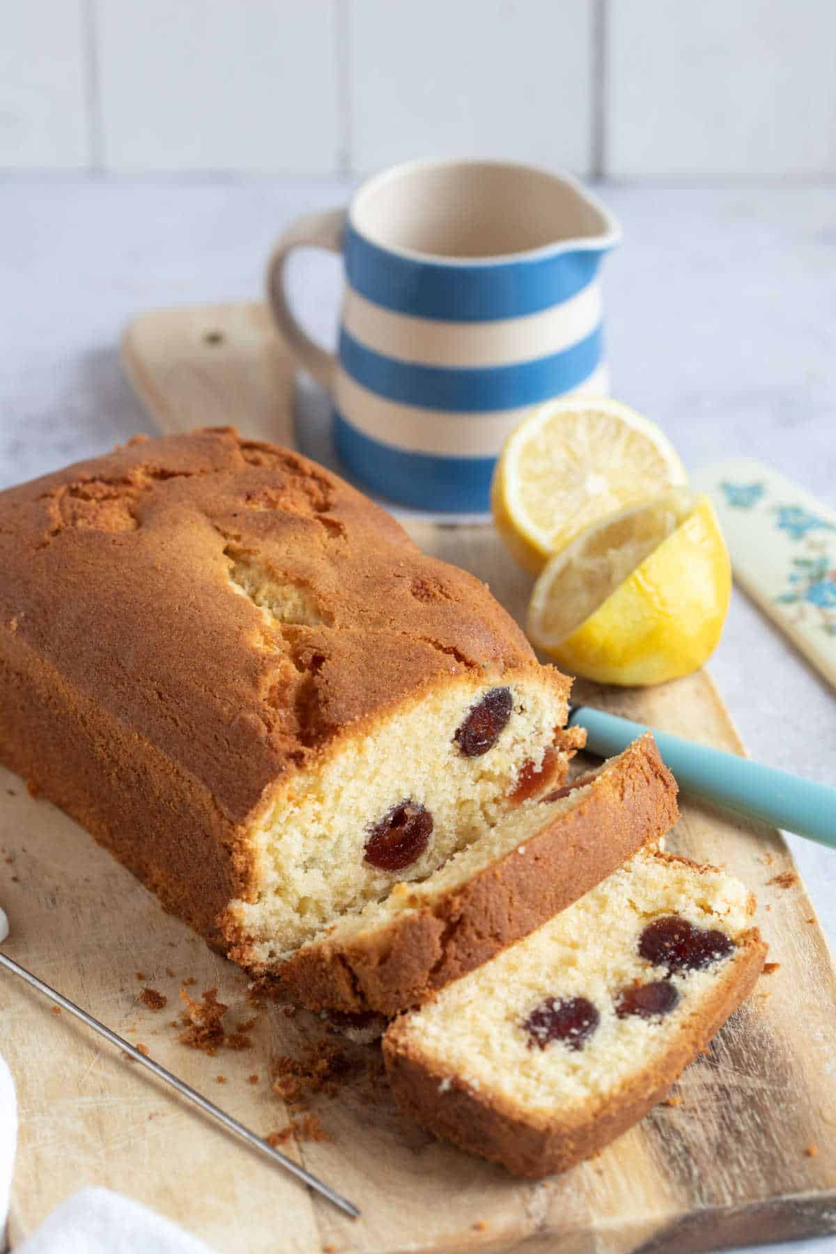 Air fryer cherry cake on a wooden board.