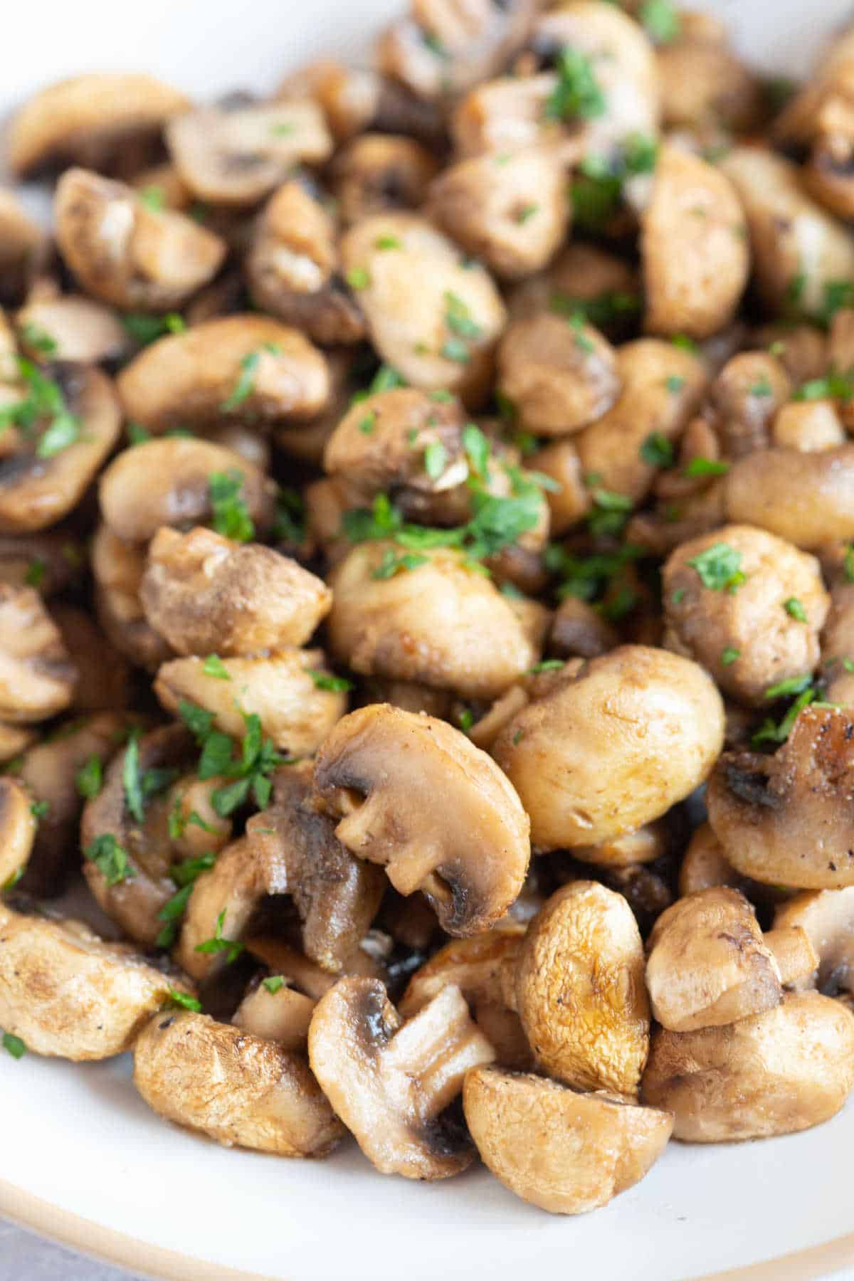 Air fryer mushrooms on a plate.