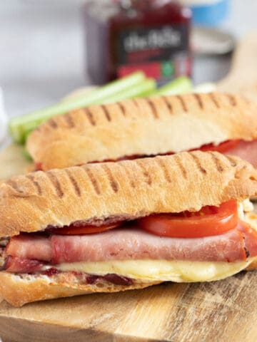 Gourmet air fryer panini on a wooden board.