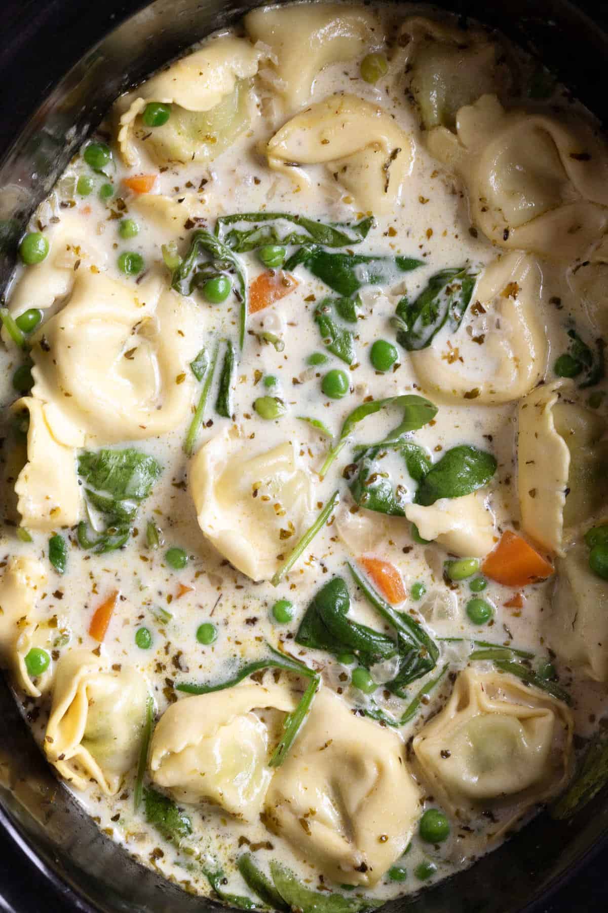 Creamy tortellini soup in the slow cooker.