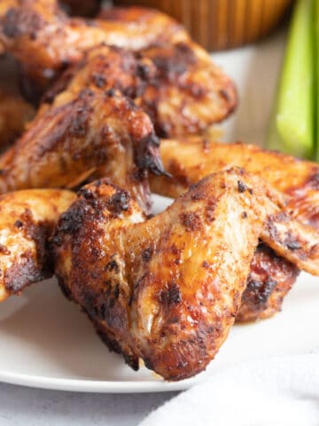 Crispy air fryer chicken wing close up.