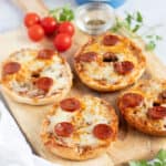 Air fryer pizza bagels with slices of chorizo.