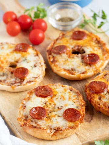 Air fryer pizza bagels with slices of chorizo.