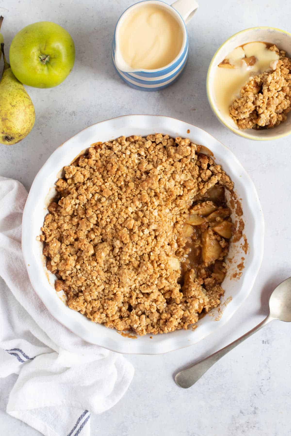 Apple and pear crumble wit ha crispy oat crumble topping.