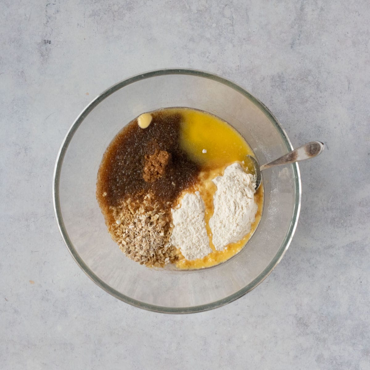 Ingredients for flapjack style crumble topping in a bowl.