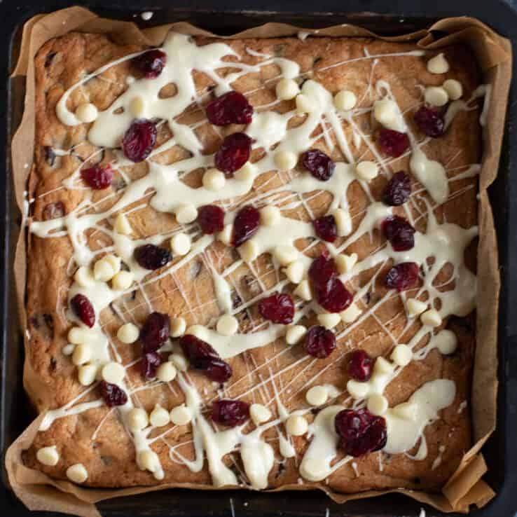 Baked white chocolate and cranberry blondies.