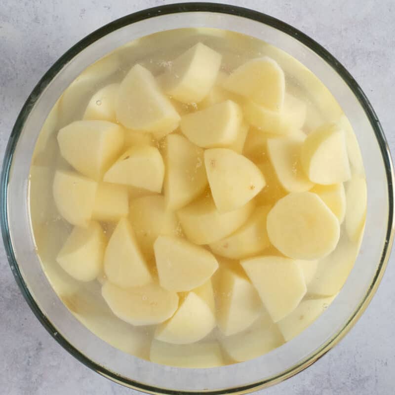 Potatoes soaking in water.