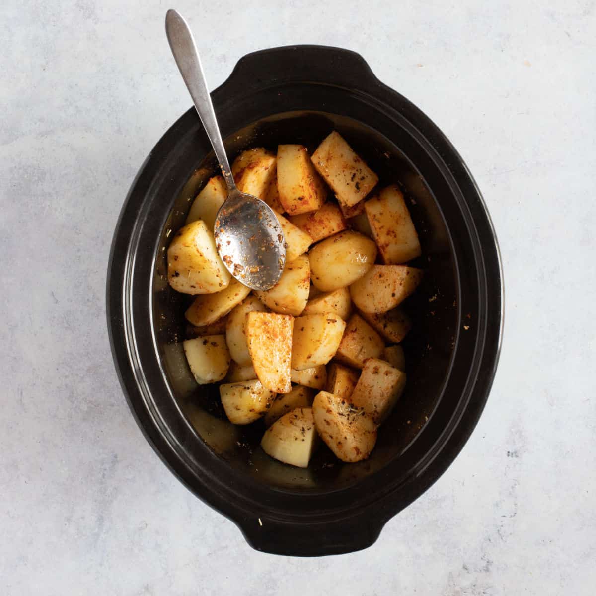 Cooked potatoes in a slow cooker.