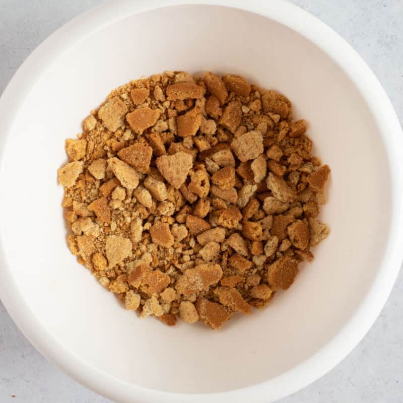 Crushed biscuits in a bowl.