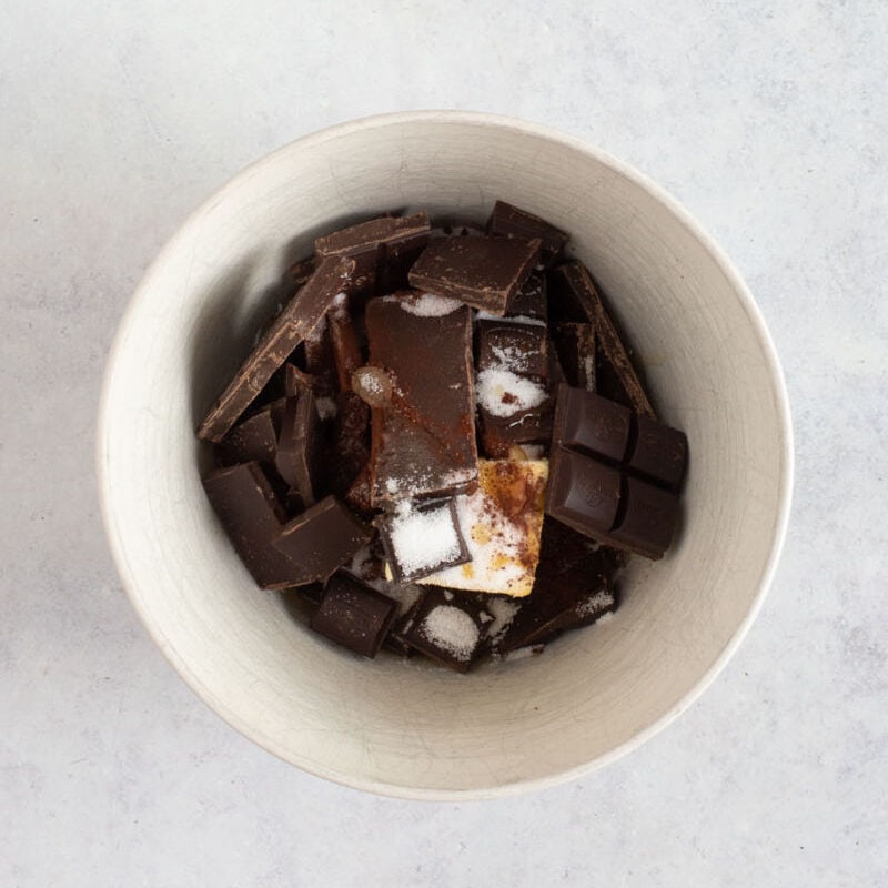 Chocolate, butter and syrup in a bowl.