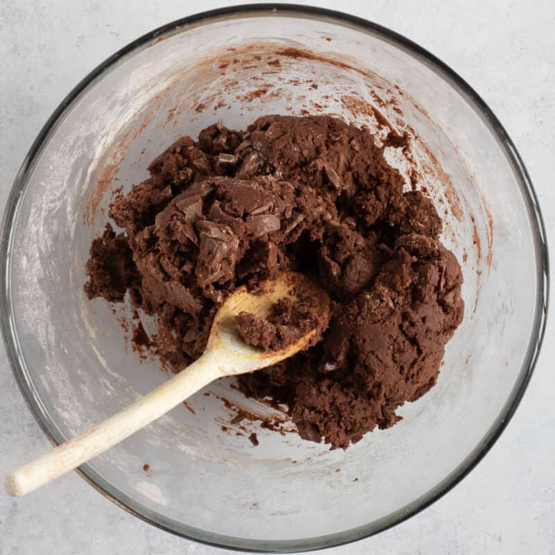 Chocolate orange cookie dough in a bowl.