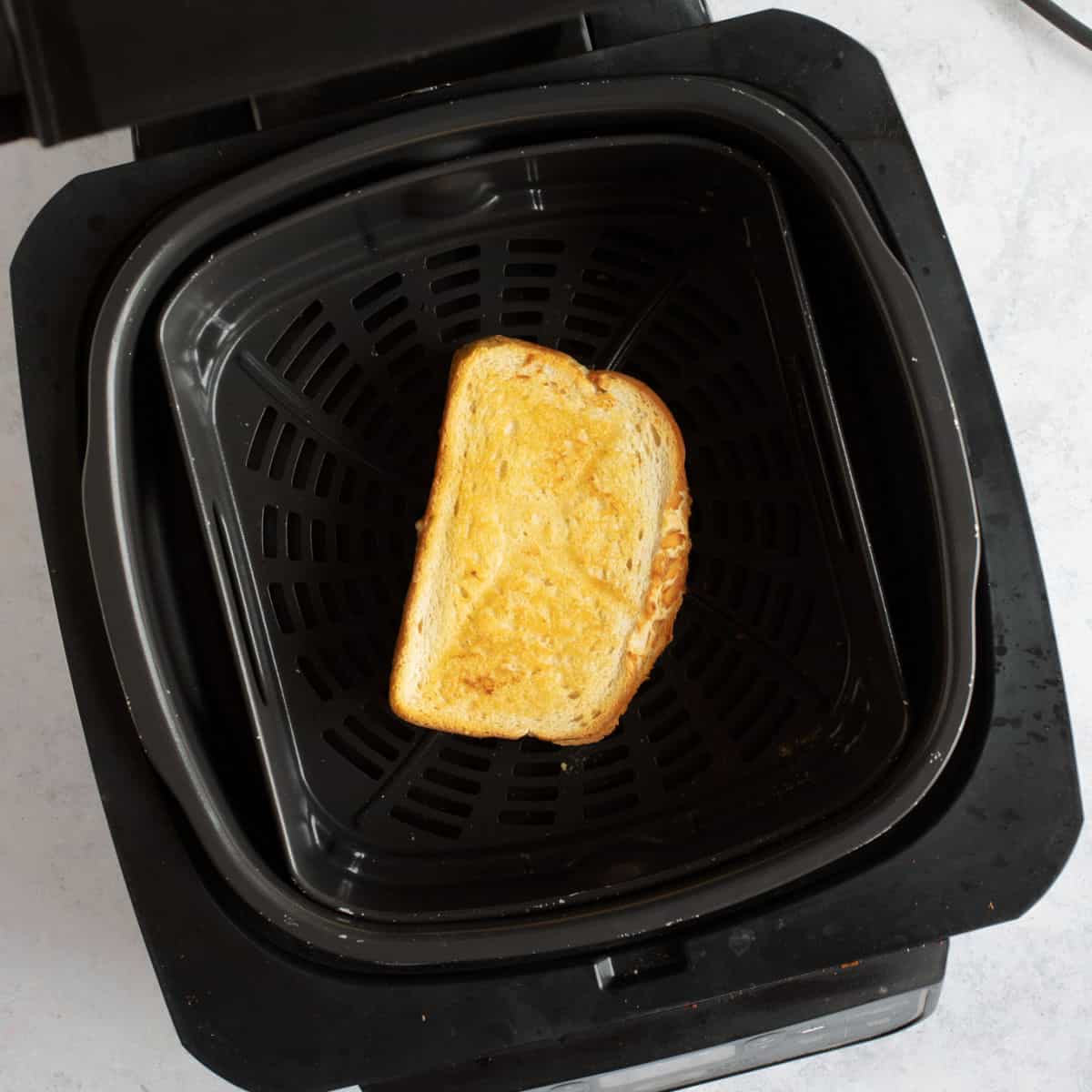 Cheese toastie in air fryer.