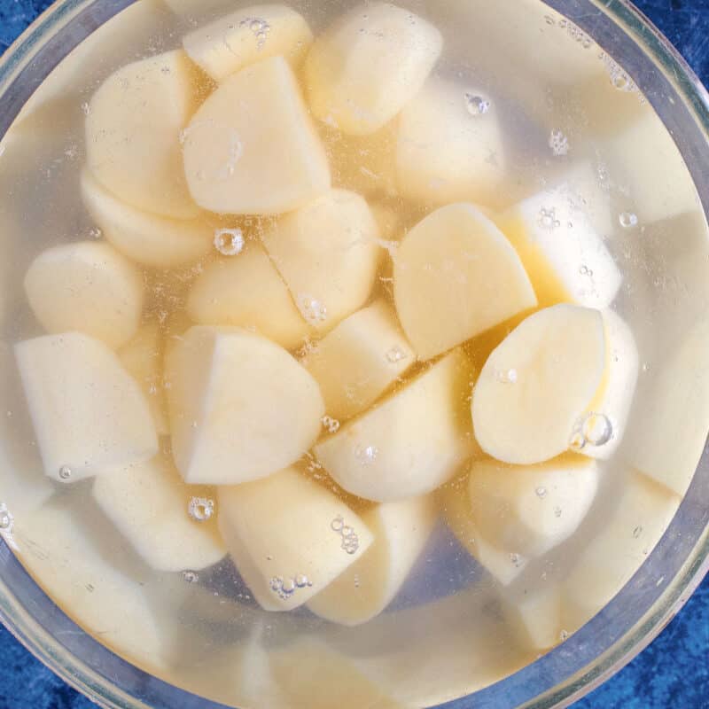 Potatoes soaking in water.