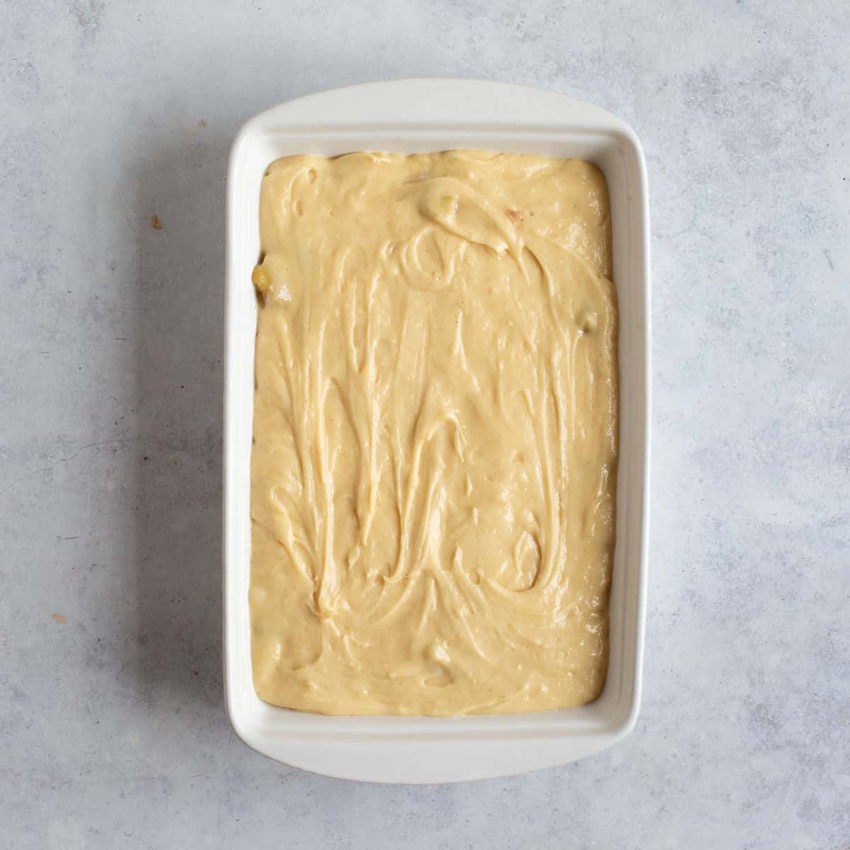 Sponge batter topping the stewed apples.