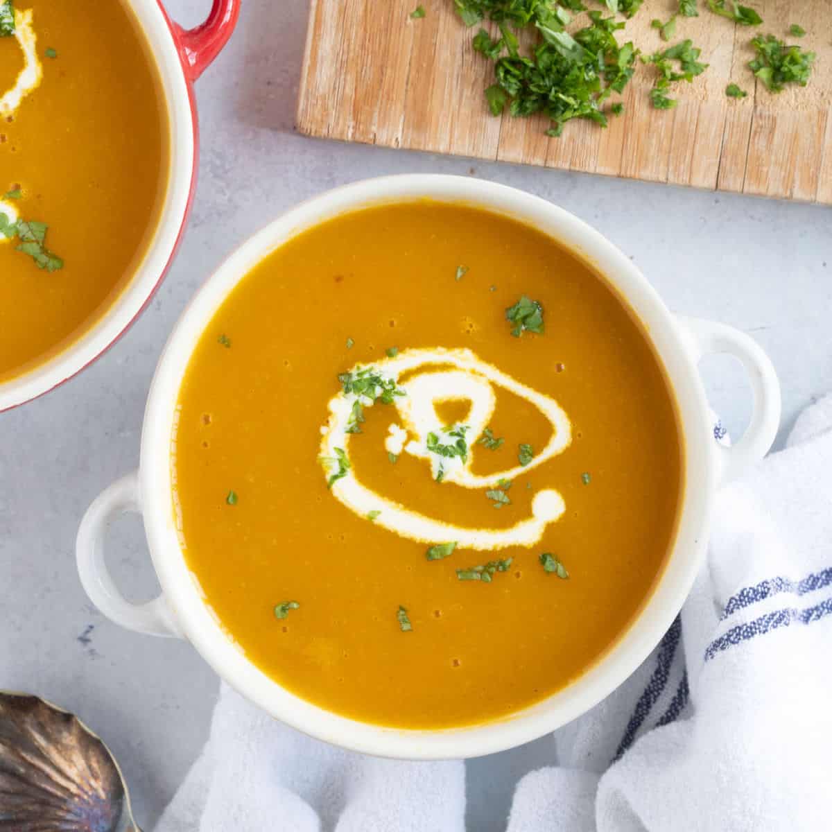 A bowl of carrot and parsnip soup.