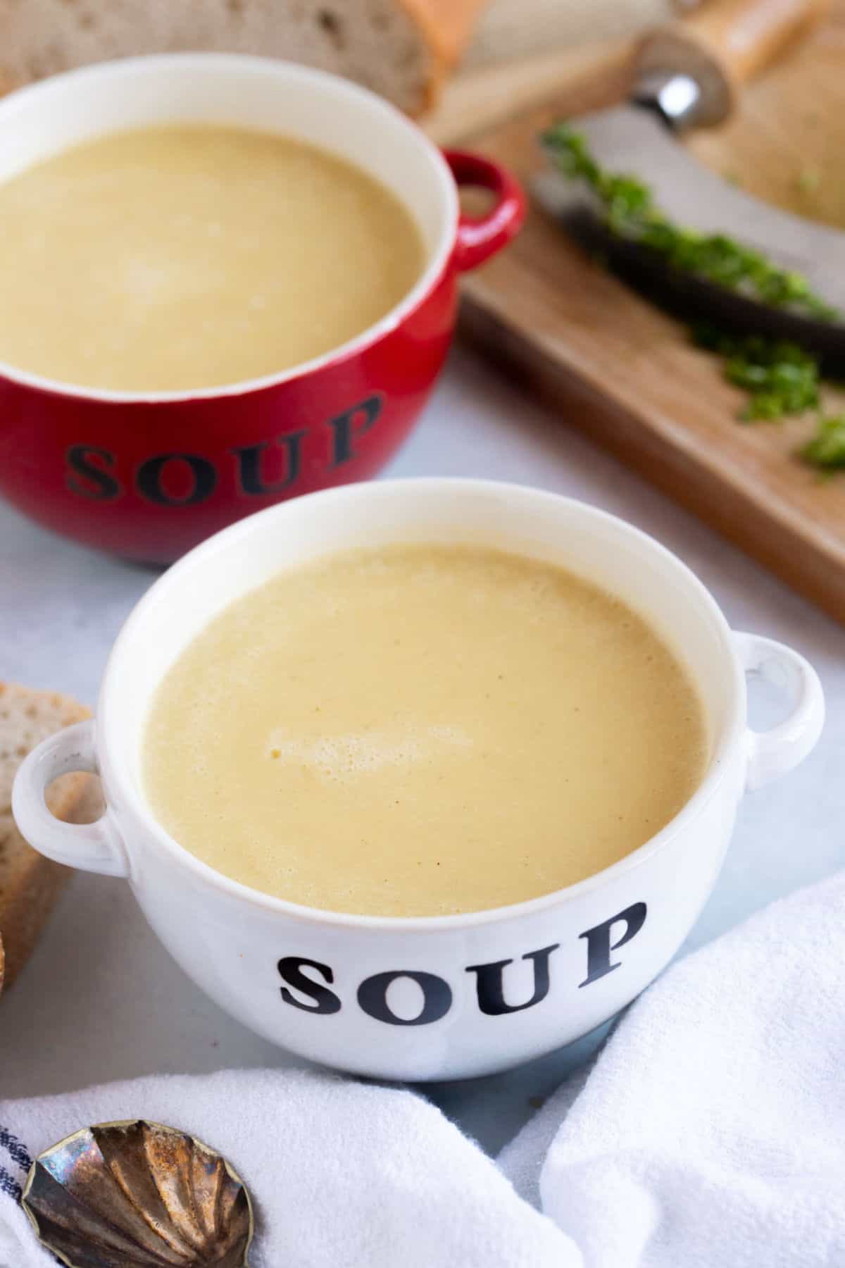 Creamy leek and potato soup in a bowl.