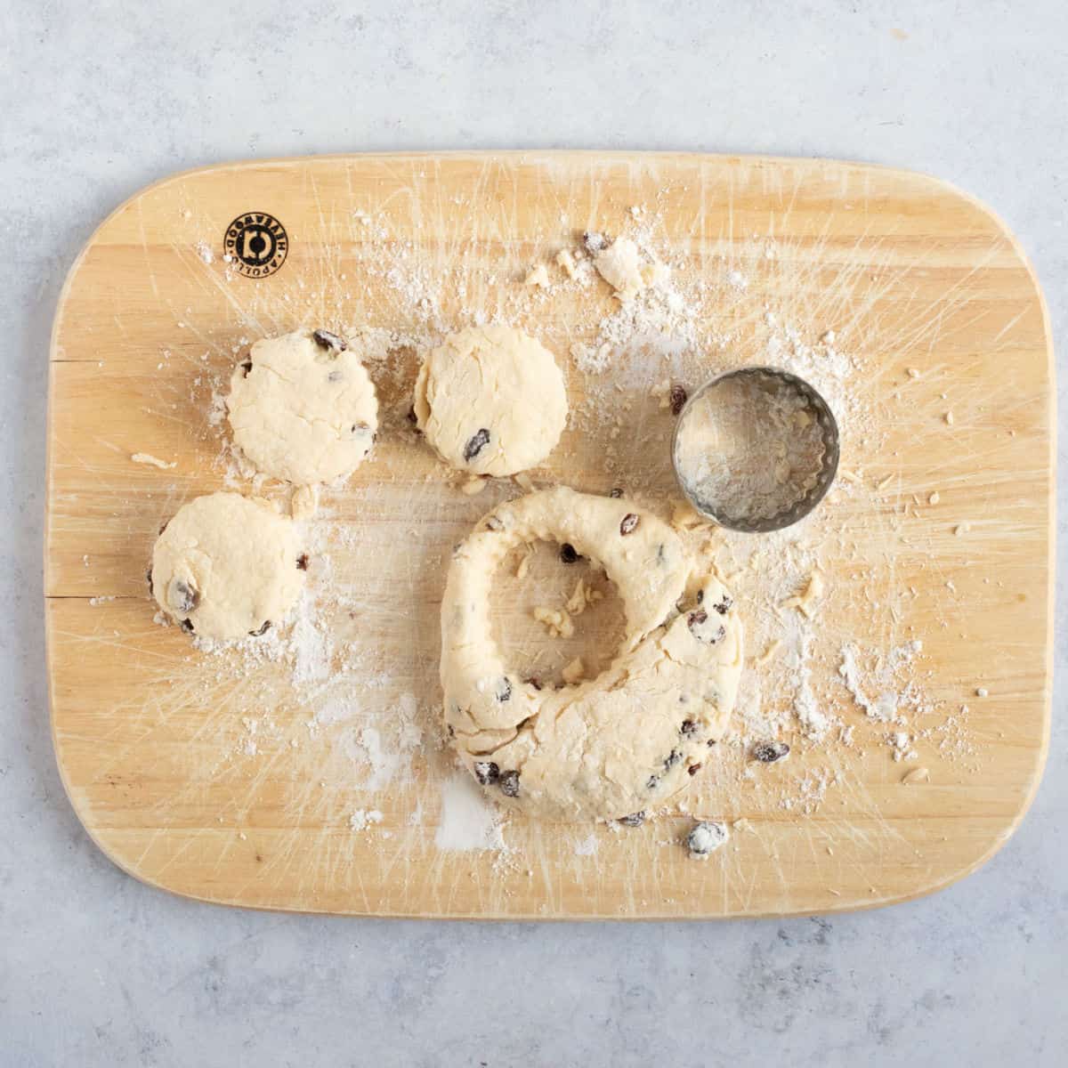 Scone dough on a wooden board.