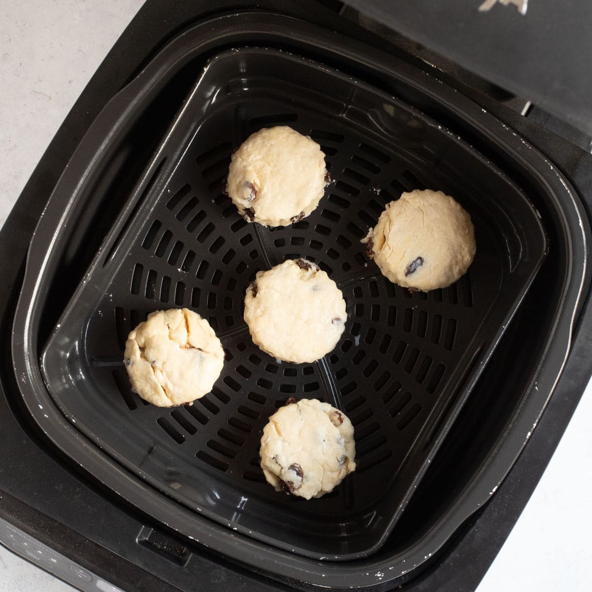Unbaked scones in air fryer.