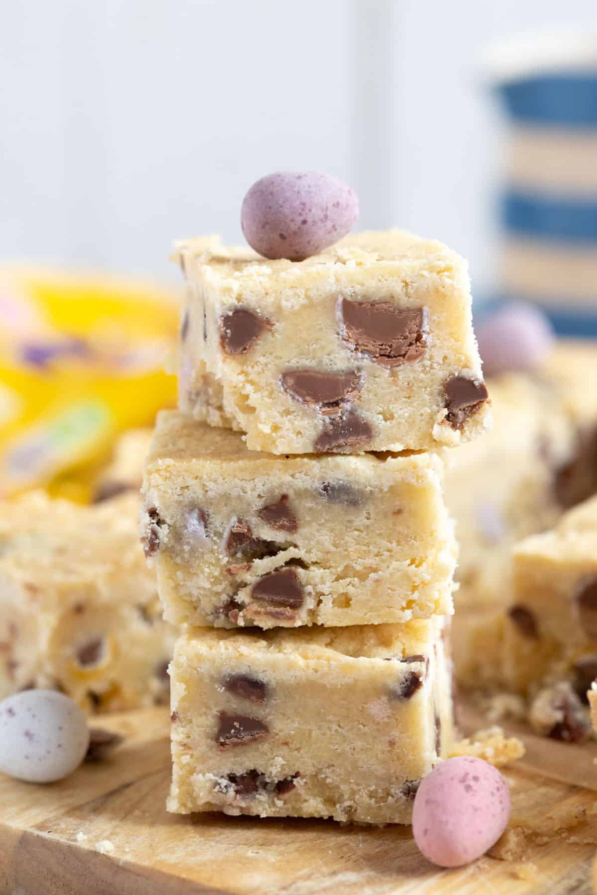 A stack of three mini egg shortbread squares.