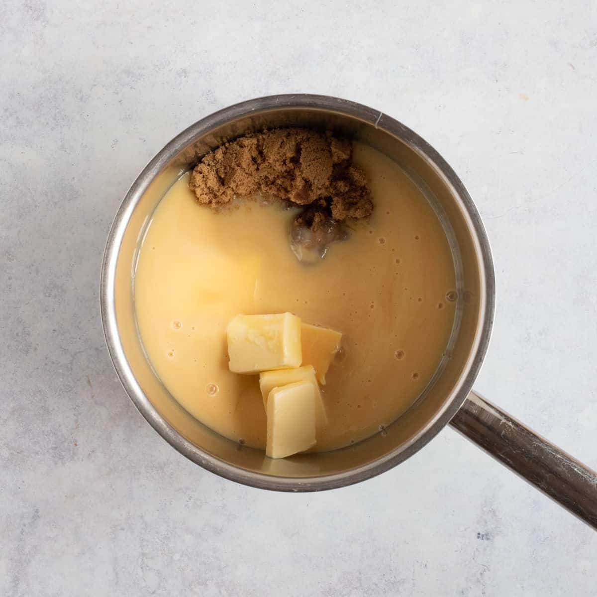 Caramel layer ingredients in a saucepan.