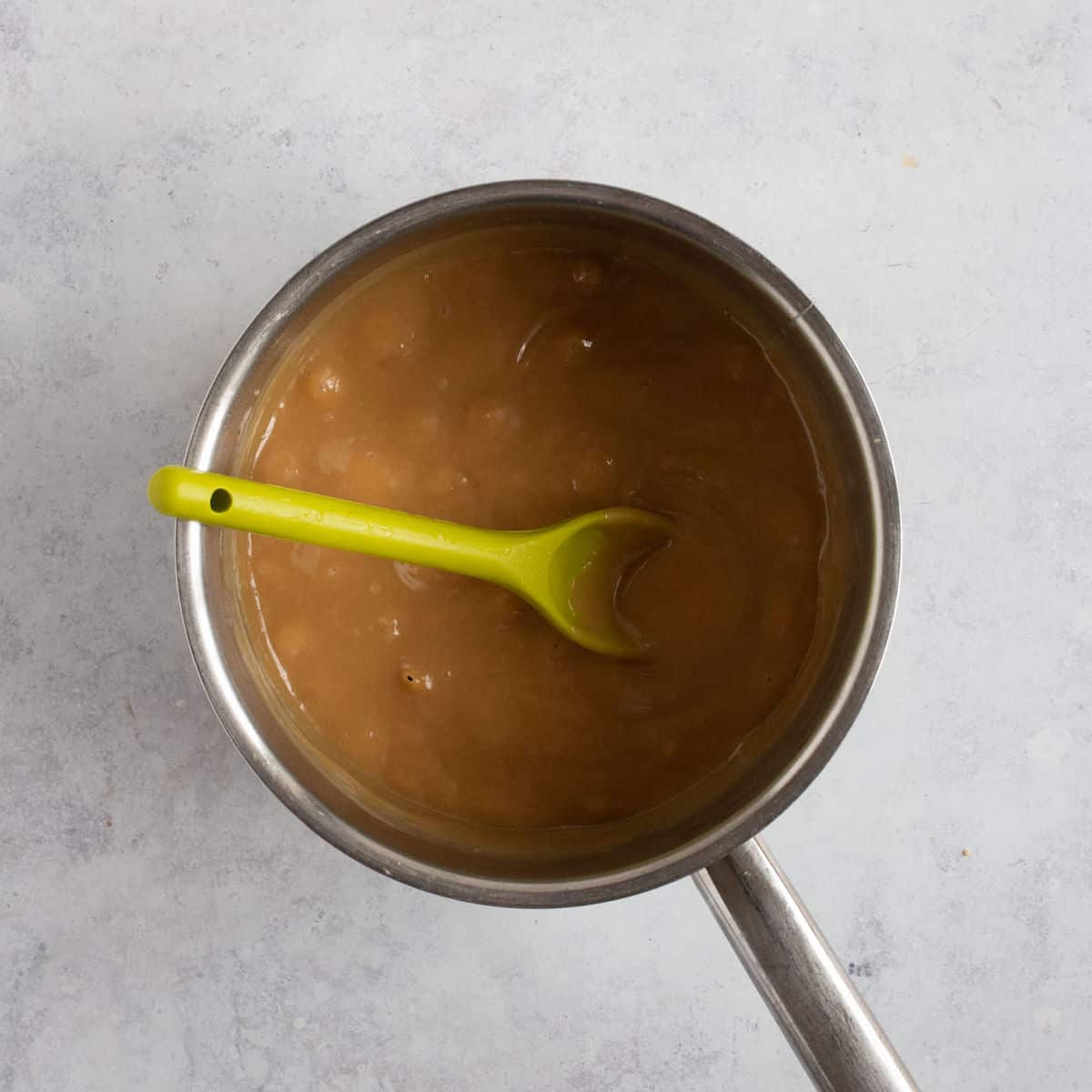 Finished caramel in a saucepan.