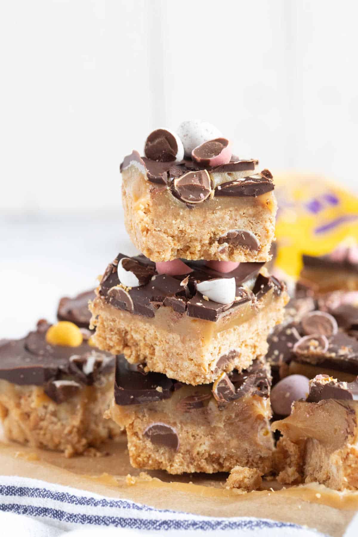 A stack of salted caramel mini egg millionaires bars.