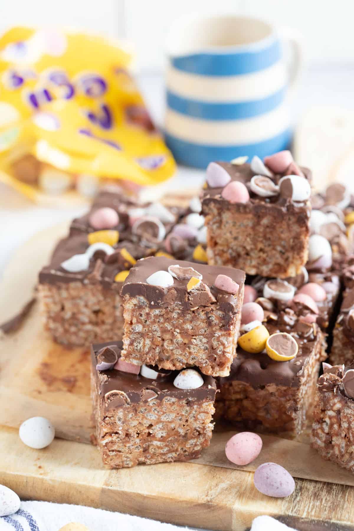 A stack of mars bar slices topped with Cadbury mini eggs.