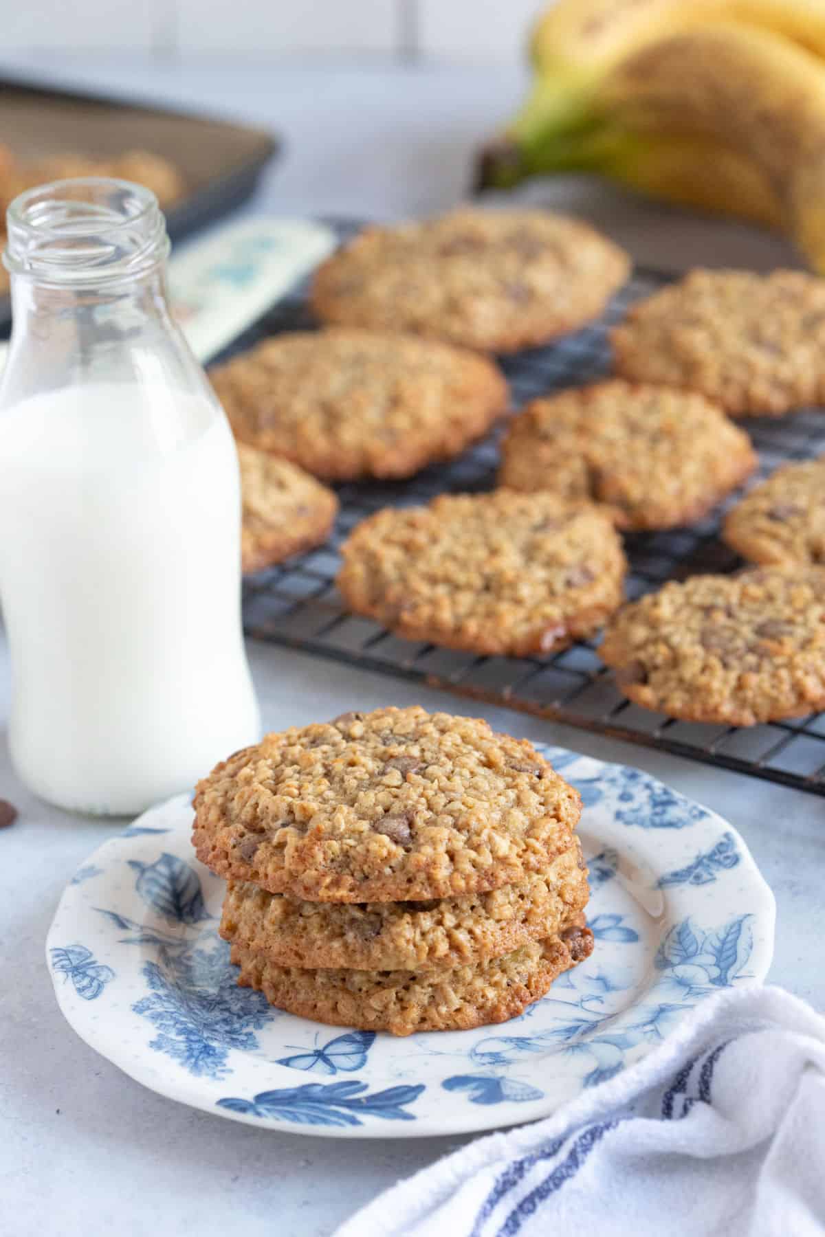 A stack of banana oat cookies on a plate.