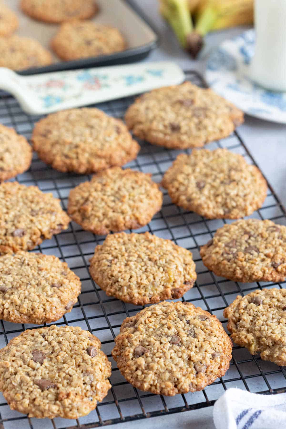 Banana oatmeal cookies on a wire rack.
