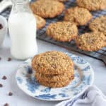 Banana oat and choc chip cookies on a plate.